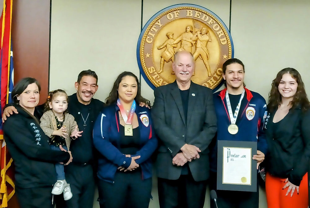 The Fleming family receiving their proclaimation from Bedford mayor Stan Koci.